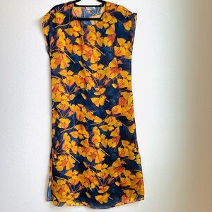 Women’s sheer cover-up with golden Ginko leaves on a navy background XS